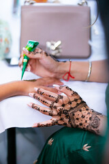 Indian Punjabi bride's wedding henna mehendi mehndi hands close up