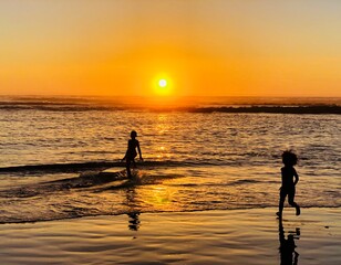 Fototapeta na wymiar golden hour sunset kid running