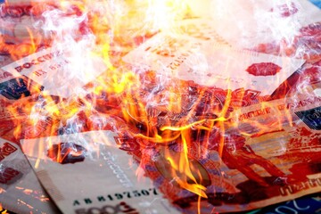 Background of russian rubles with fire flames