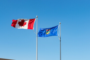 Canada Maple Leaf flag and Alberta provincial flag - obrazy, fototapety, plakaty