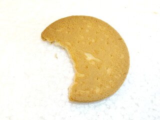 half a biscuit on a white background