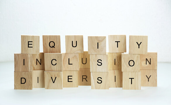 Diversity, Equity, Inclusion Words On Wooden Blocks Background DEI Concept