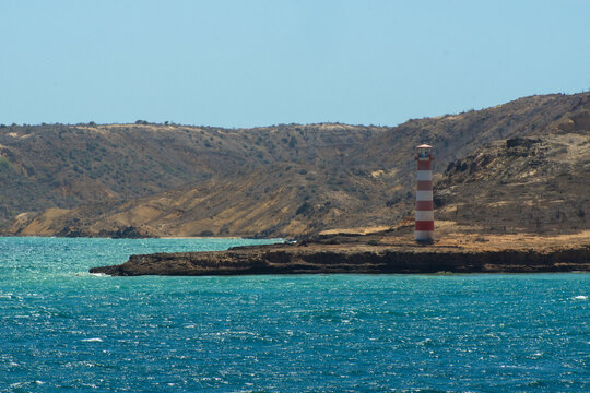 Panoramic view of a lighthouse standing at the coast Cubagua Island, Caribbean Sea, Venezuela. 