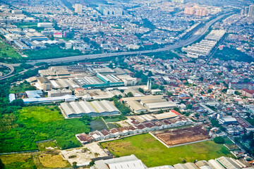 Obraz premium Jakarta Bay view from the airplane window that looks crowded and busy