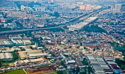 Jakarta Bay view from the airplane window that looks crowded and busy