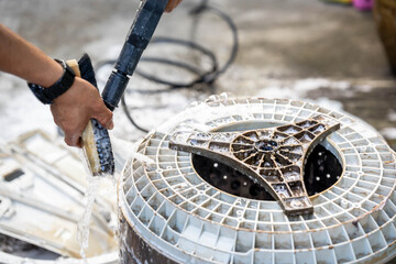 Washing machine drum has been removed to clean the dirt from the water scale and the dust from the...