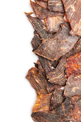Beef jerky meat. Dried sliced meat isolated on white background.