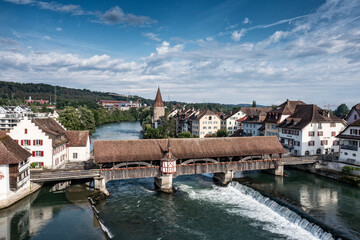 MEDIEVAL WOODENBRIDGE OVER THE RIVER 