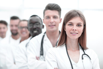 Fototapeta premium doctors team showing finger in camera