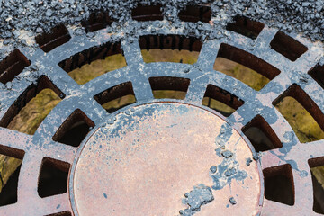 Cast iron storm sewer manhole. Close-up. View from above. drainage system. Rainwater runoff.
