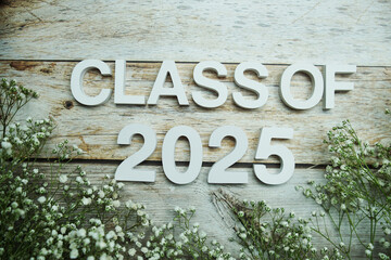 Class of 2025 alphabet letter on wooden background