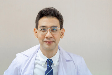 Portrait of Cheerful doctor posing and smiling at hospital, Medical healthcare and doctor service