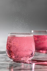 Fresh pink drink with bubbles