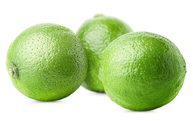 three whole limes on a white isolated background