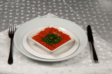 Hot pepper sauce made from paprika, various spices and parsley. Hot pepper sauce is eaten as an appetizer.