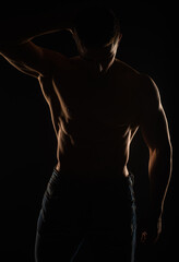 Obraz na płótnie Canvas Portrait of topless guy, silhouette