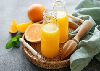 Bottles of fresh orange juice