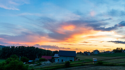 Obraz premium sunset over the village