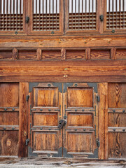 The door of a traditional Korean house made of wood