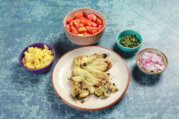 preparation of making begun varta or barbeque of brinjal