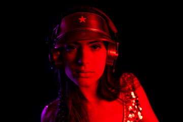 Female dancer posing against black background