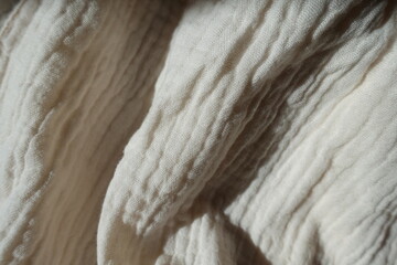 Folded simple thin white cotton muslin fabric