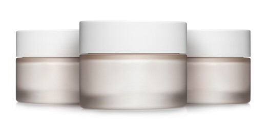 Cosmetic cream jars, isolated on white background