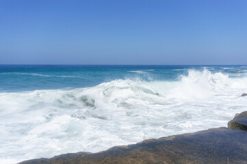 Storm at sea. Big, white waves of the sea.