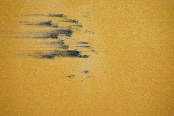 There is a flaw in the road marking paint. from the heat of asphalt