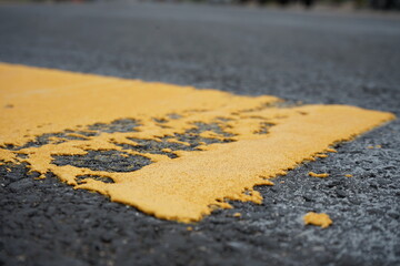 abstract yellow traffic line to facilitate road safety