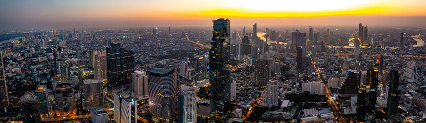 Obraz premium Aerial view of King Power Mahanakhon tower in Sathorn Silom central business district of Bangkok, Thailand