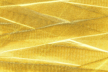 Background of intertwined medical bandages in gold color. Very expensive medical care available only to rich people