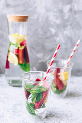 Summer refreshing drink with rhubarb, lemon and mint