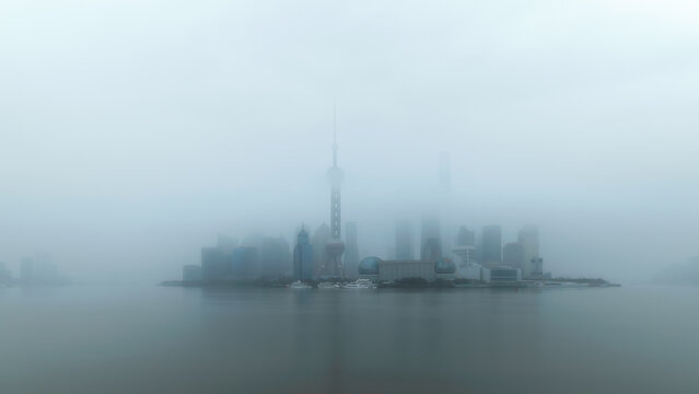 Overlook Wonderland lujiazui CBD in Shanghai in the Overlooking the skyscrapers in Lujiazui, the financial center of Shanghai Pudong, across the bank in the fog