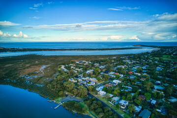 Aerial view looking downstream towards the mouth of the Barwon River near Barwon Heads, Victoria,...