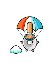 cooking spoon mascot cartoon is skydiving with happy gesture