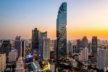 Obraz premium Aerial view of King Power Mahanakhon tower in Sathorn Silom central business district of Bangkok, Thailand