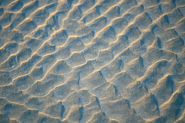 Fototapeta na wymiar Beach sand surface pattern. Abstract. High angle view.