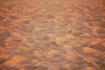 Fototapeta na wymiar Golden colored sand abstrct.