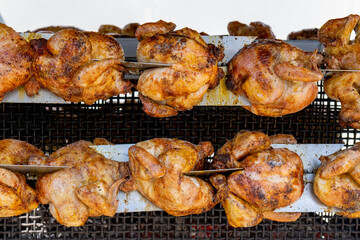 Crispy grilled chicken on an outdoor grill