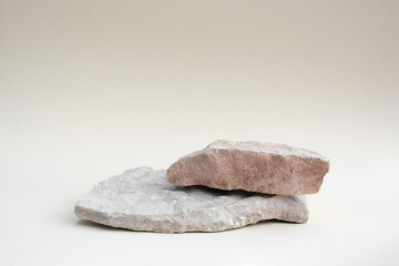 Stone Podium for promotion on beige Background. Natural pedestal. Two stone podiums. Beauty product...