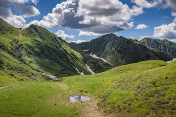 Fototapeta premium Beautiful nature. Mountain hiking Trail Road. Italy Lago Avostanis Casera Pramosio Alta
