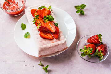 Italian strawberry dessert Semifreddo with sauce - cold dessert like an ice-cream