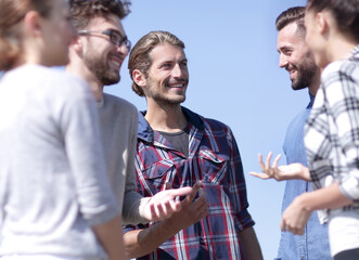 closeup .a team of friends is discussing