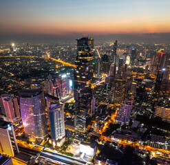 Fototapeta premium Aerial view of King Power Mahanakhon tower in Sathorn Silom central business district of Bangkok, Thailand