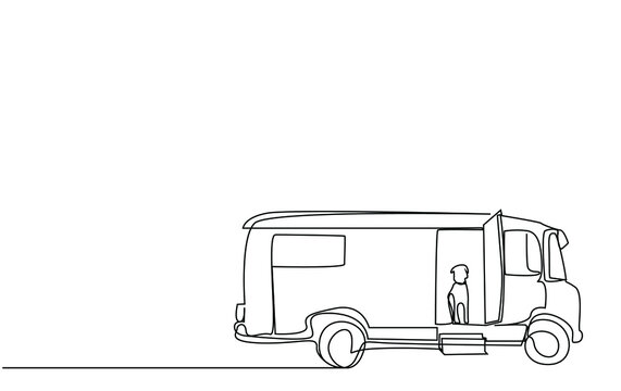 recommend clip art: a big classic caravan and a dog inside looking out vacation concept