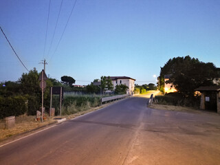 Countryside Tuscany road at dusk