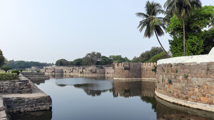 Fototapeta premium Vellore Fort walls and moat. Fort was built by Chinna Bommi Reddy and Thimma Reddy Nayak in 16th Century under the Vijayanagar Empire, Vellore, Tamilnadu, India.