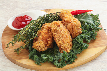 Crispy chicken wings with tomato ketchup