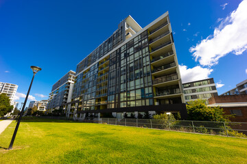 Residential high rise apartment building in inner Sydney suburb NSW Australia. Residential complex in leafy suburbia. Urban living high density suburban city 